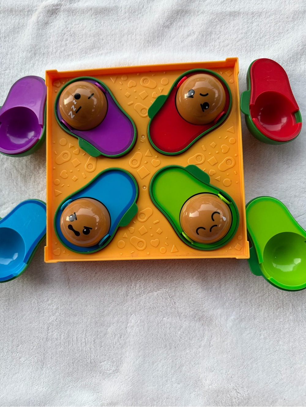 Avocados emoji- developing social- emotional motor. Purple, Red, Blue & Green